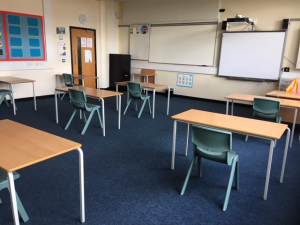 Photos 2a and 2b – Classroom set up for 8 students